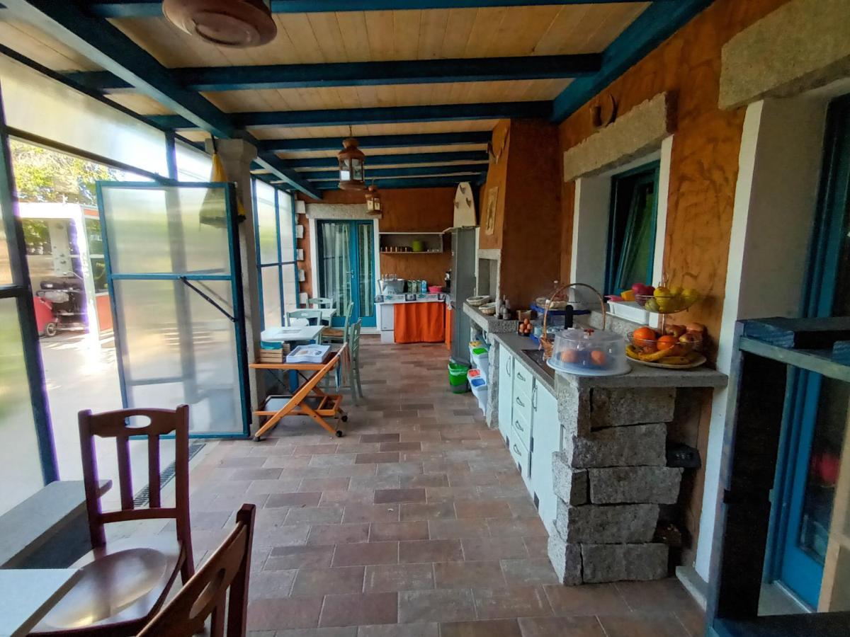 Portopollo Surfhouse Barrabisa 外观 照片
