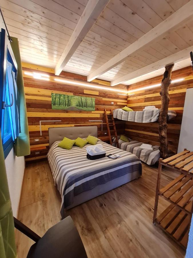 Portopollo Surfhouse Barrabisa 外观 照片
